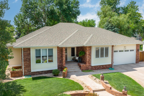 Home with Malarkey Roofing Products Weathered Wood Legacy Shingles in Greeley, CO