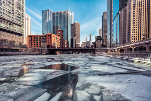 chicago city skyline, icy river.